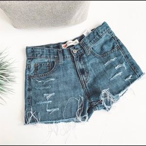 Levi’s 550 High Waisted 90s Distressed Jean Shorts